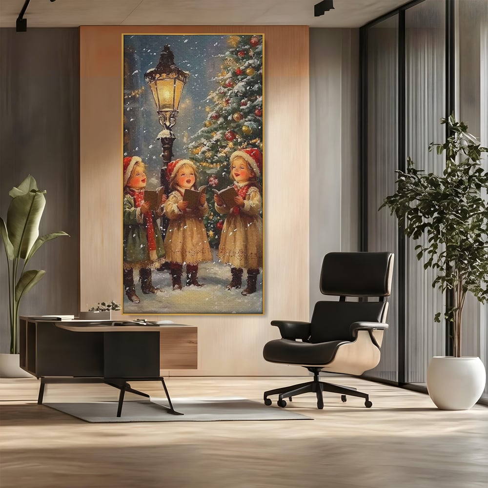 Tablou canvas cu pictura cu trei fetite colindatoare, in rama de aluminiu auriu, pe perete intr-un birou